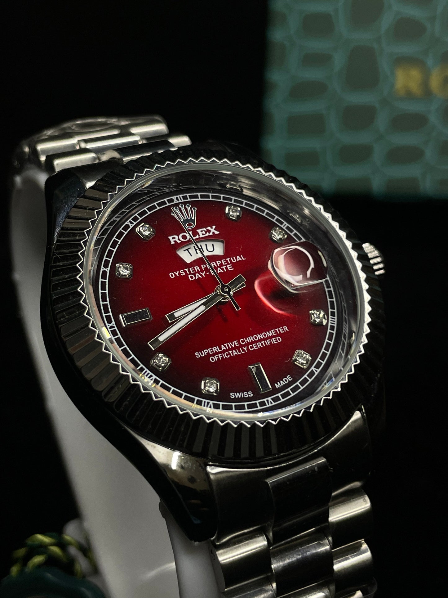 Rolex Day-Date with Fluted Bezel and Diamond-Set Red Dial