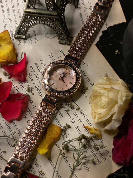 True Worth (rose gold-tone, crystal bezel, multi-link bracelet)